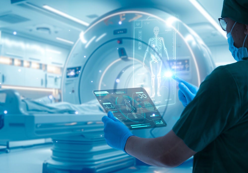 Medical, MRI, MRT, Imaging, Doctor work with tablet computer,digital healthcare technology,system analysis network connection hologram virtual screen interface,online medical examination analysis report,surgical operation room