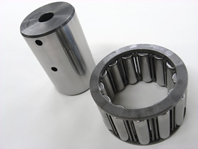 Long-Life Cage and Roller Assembly With Planetary Shaft for the Swing/Travel Reduction Gear of Construction Machinery