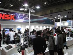 The popular NSK booth draws crowds of visitors.