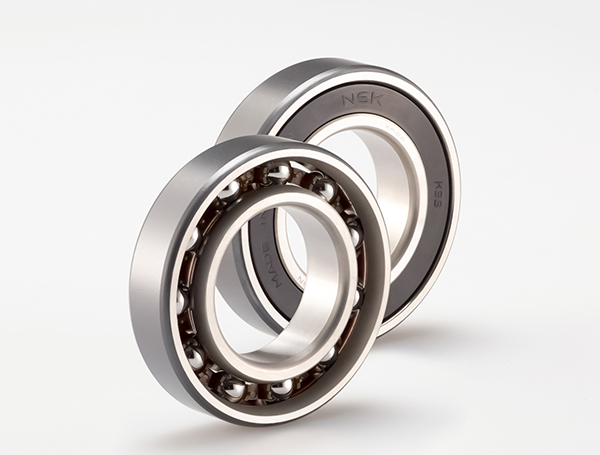 Automobile Transmission Bearing with Solid Lubricant Film that Resists Housing Wear