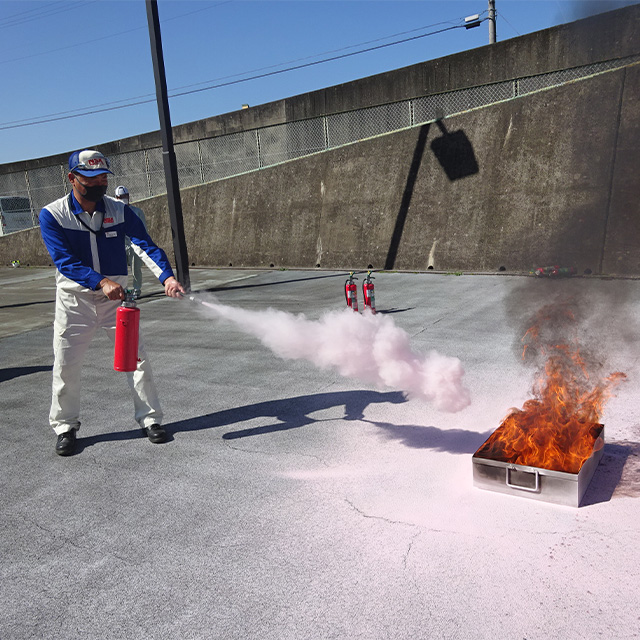 Fire extinguishing drill with gasoline / kerosene mixture